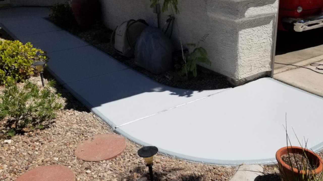 Concrete walkway restoration from prolonged water damage